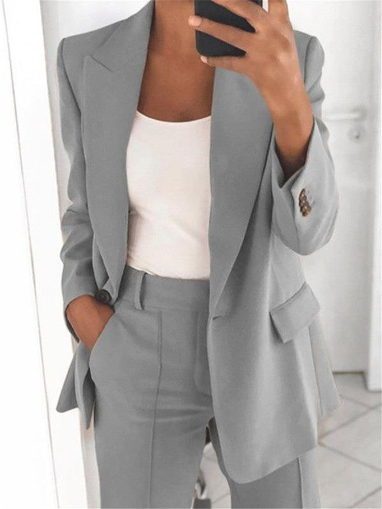 Executive Allure: Sleek Blazer and Fitted Trousers Duo